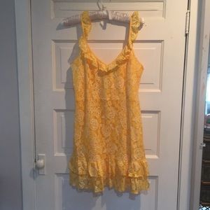 A yellow lace short sleeveless dress